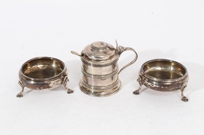 Lot 322 - Pair of early George III salts of cauldron form, raised on three hoof feet, (London 1762), together with a George V silver mustard pot (Birmingham 1912), maker George Unite and an associated silver...