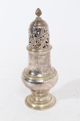 Lot 323 - George II silver pepperette of baluster form engraved armorial and pierced slip in cover, on domed pedestal foot, (London 1758), maker John Delmester, all at approximately 6oz, 14.5cm in height