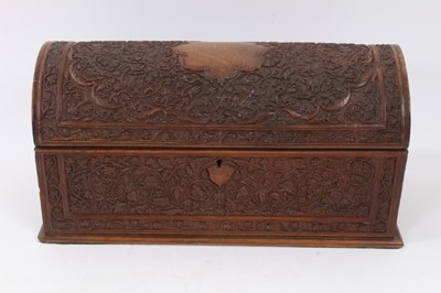 Lot 863 - Late 19th Century Anglo-Indian carved hardwood stationary box of large proportions with fitted interior and key