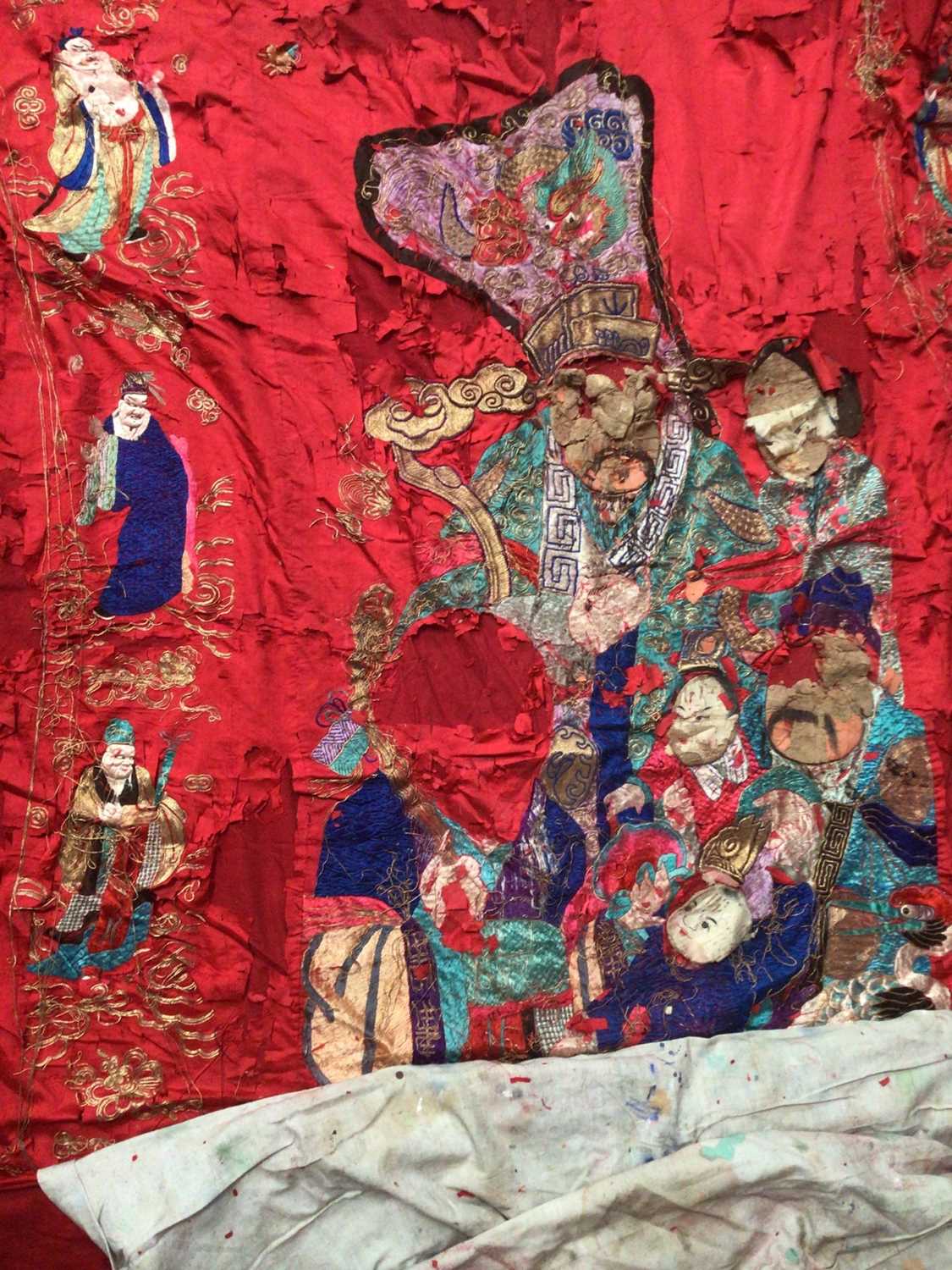 Lot 103 - Antique Chinese red silk wall hanging, 52" wide in distressed condition