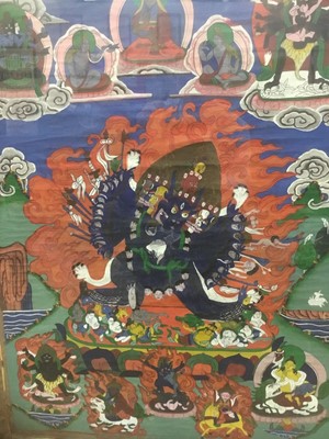 Lot 2395 - Tibetan Thangka on cloth framed