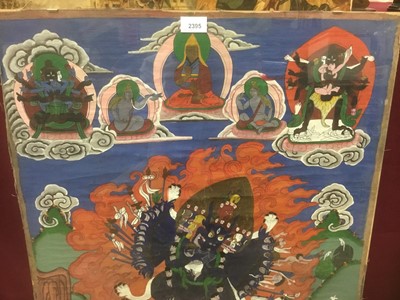 Lot 2395 - Tibetan Thangka on cloth framed