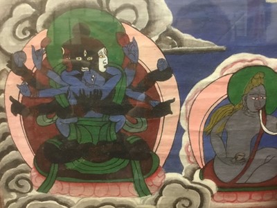 Lot 2395 - Tibetan Thangka on cloth framed