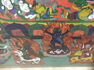 Lot 2395 - Tibetan Thangka on cloth framed