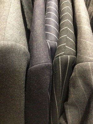 Lot 1909 - Gentlemen's vintage clothing, three pin-striped suits the trousers have turn-ups. Plus a grey suit by Bower Roebuck, trousers also have turn-ups and a navy blazer by Coes. Also a Celtic brand tri...