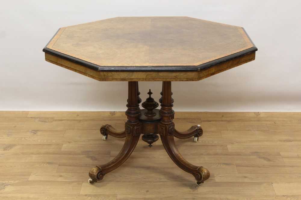 Lot 346 - Victorian walnut octagonal centre table with burr wood crossbanding, on turned supports