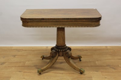 Lot 1478 - Good quality Regency rosewood card table on canon barrel column and four splayed legs with brass capped castors