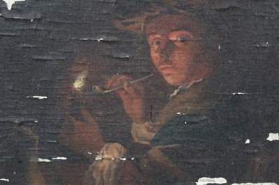 Lot 1243 - Studio of G. Schalken oil on panel - lighting a pipe, in ebonised frame