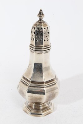 Lot 338 - George V silver sugar caster of faceted octagonal form with pierced slip in cover on octagonal foot, (London 1935), maker C J Vander Ltd, all at approximately 8oz, 20cm in overall height