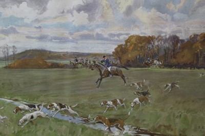 Lot 1004 - Lionel Edwards (1878-1966), two coloured prints - Royal Artillery Bordon Drag Hounds and Epsom, in glazed frames, 28cm x 39cm and 24cm x 39cm