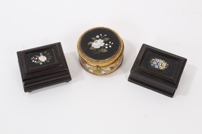 Lot 746 - 19th century Continental pietra dura inlaid ebonised stamp box, rectangular form on bun feet, 6cm wide, together with a circular brass and pietra dura panel inset ring box and stamp box wit h micro...