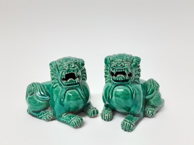 Lot 237 - Pair turquoise foo dogs