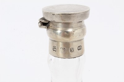 Lot 441 - Victorian silver mounted glass bottle, possibly for whisky, with hinged cover, (Birmingham 1897), maker Hukin & Heath, 13.5cm in overall height