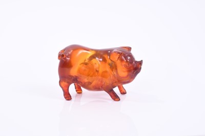 Lot 855 - Chinese carved amber figure of a pig