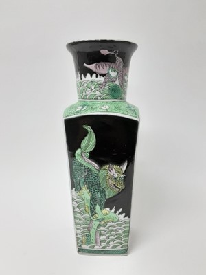 Lot 150 - Chinese famille noire porcelain vase, 19th/20th century, of tapered rectangular form, painted with dragons on each side, with fish and horses around the neck, six-character Kangxi mark to base, 36c...