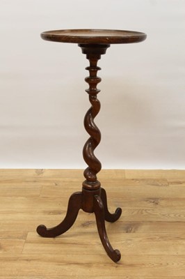 Lot 1432 - Antique fruitwood wine table, the circular dished top above spiral fruitwood column and tripod feet