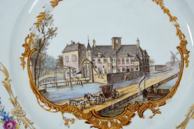 Lot 169 - A Meissen plate from the Stadhouder William V service, circa 1772-74, blue crossed swords and dot mark, the centre painted with a view of 'Het Huys Nyenrode by Breukelen', titled on the reverse in...