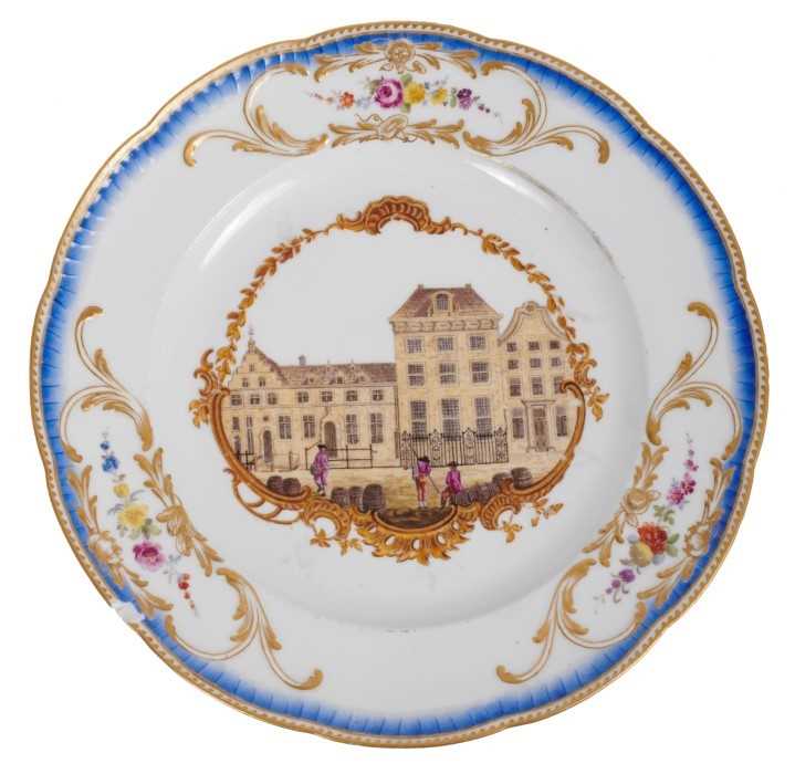 Lot 171 - A Meissen plate from the Stadhouder William V service, circa 1772-74, blue crossed swords and dot mark, the centre painted with a view of 'Het Oost Indisch Huis te Delft', titled on the reverse in...