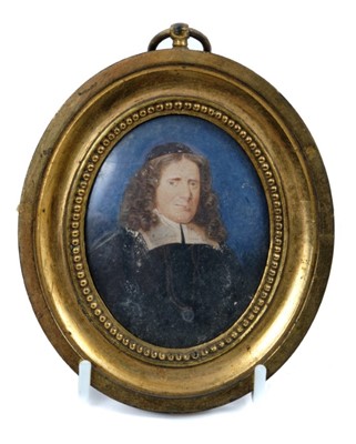 Lot 850 - 17th century Continental school portrait miniature on ivory depicting a priest against a midnight blue ground, oval, 8 x 6cm, in glazed gilt metal frame