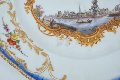 Lot 173 - A Meissen plate from the Stadhouder William V service, circa 1772-74, blue crossed swords and dot mark, the centre painted with a view of 'De Stad Montfoort', titled on the reverse in black script,...