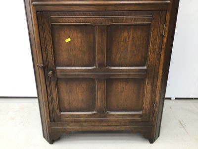 Lot 176 - Carved oak corner cabinet H180, W79, D42cm