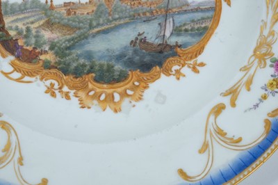 Lot 174 - A Meissen plate from the Stadhouder William V service, circa 1772-74, blue crossed swords and dot mark, the centre painted with a view of 'De Stade Arnhem', titled on the reverse in black script, t...