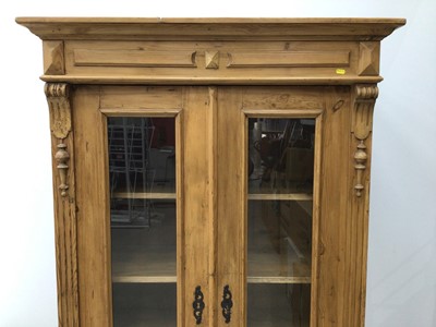 Lot 167 - Pine display unit with glass doors