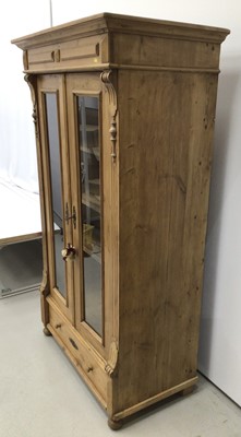 Lot 167 - Pine display unit with glass doors