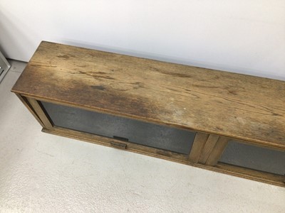 Lot 177 - Low long oak bookcase H36, W159, D28cm
