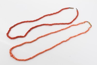 Lot 476 - Two antique coral bead necklaces, one with string of graduated coral beads measuring approximately 6.90mm to 2.75mm