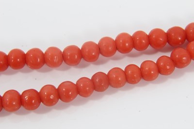 Lot 478 - Antique coral bead necklace with a string of graduated coral beads measuring approximately 8.2mm to 4.1mm, on a barrel clasp. Length approximately 46cm.