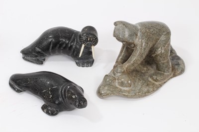 Lot 861 - Inuit carved stone figure of a walrus, together with two further Inuit stone carvings