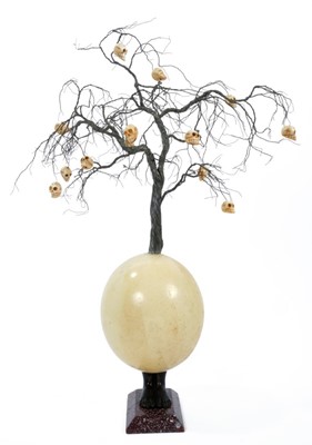 Lot 1809 - Robert Barley sculptural composition - Tree of life, utilising an ostrich egg and various other materials, raised on marble plinth, 52cm high