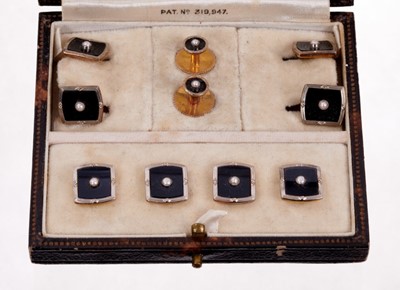 Lot 483 - Set of Art Deco gentlemen's gold black onyx and seed pearl dress studs comprising a pair of cufflinks, four buttons and a pair of shirt studs, all in original fitted leather box.