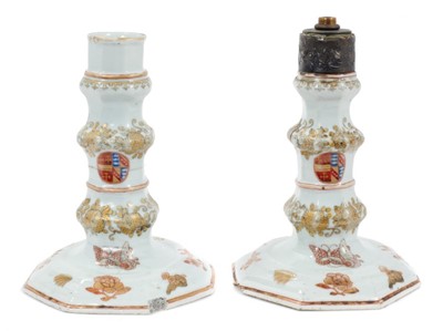 Lot 191 - A rare pair of 18th century Chinese armorial porcelain candlesticks, circa 1740