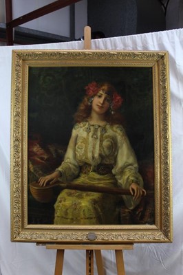 Lot 1141 - Antonio Torres Fuster (1874-1945) Orientalist portrait girl with instrument