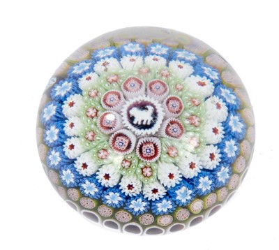 Lot 196 - Fine Saint Louis dated concentric millefiori paperweight, signed and dated SL 1848 to one cane, the centre with a silhouette of a dog facing left, 8cm diameter