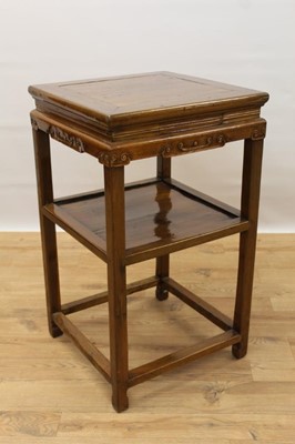 Lot 1497 - Chinese elm and hardwood two tier urn table