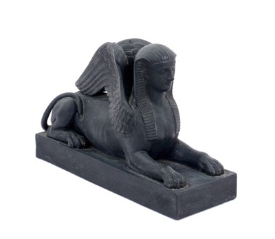 Lot 198 - Rare 19th century Wedgwood basalt model of a Sphinx, on a rectangular base, impressed WEDGWOOD'with the letter C, 15cm long