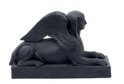 Lot 198 - Rare 19th century Wedgwood basalt model of a Sphinx, on a rectangular base, impressed WEDGWOOD'with the letter C, 15cm long