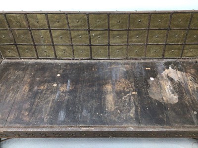 Lot 150 - Unusal wooden bench with brass and iron strap...