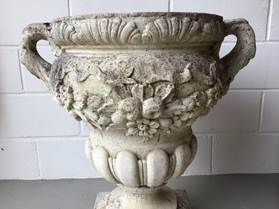 Lot 151 - Large concrete urn with floral decoration and twin handles on square base H76, W68, D49cm