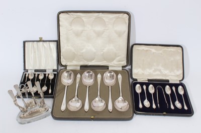 Lot 365 - Set of six Edwardian silver coffee spoons and matching sugar tongs (Sheffield 1906), maker James Dixon & Sons, in a fitted case, together with a set of six George VI silver coffee spoons (Birmingha...