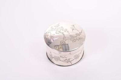Lot 393 - Early 20th century Chinese silver pot and cover of cylindrical form with engraved decoration depicting birds and flowering prunus trees