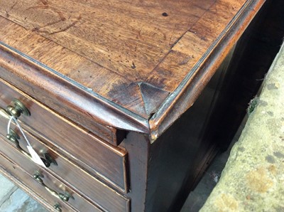 Lot 1445 - George II mahogany dressing chest of small size, with crossbanded top over brushing slide and four graduated drawers, each with brass swan neck handles on ogee bracket feet, 82cm wide x 48cm deep x...