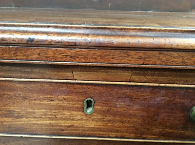 Lot 1445 - George II mahogany dressing chest of small size, with crossbanded top over brushing slide and four graduated drawers, each with brass swan neck handles on ogee bracket feet, 82cm wide x 48cm deep x...