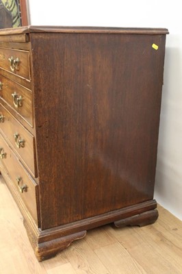 Lot 1445 - George II mahogany dressing chest of small size, with crossbanded top over brushing slide and four graduated drawers, each with brass swan neck handles on ogee bracket feet, 82cm wide x 48cm deep x...