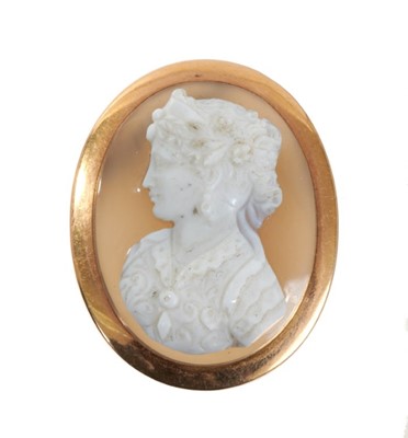 Lot 512 - 19th century carved hardstone cameo pendant/brooch depicting a classical female bust in profile, in a French gold mount. With removable pin fitting. Approximately 37mm x 30mm.