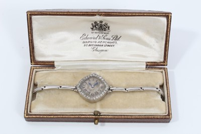 Lot 559 - Art Deco ladies diamond cocktail wristwatch by Tempor Watch Co, with lozenge shape dial and diamond set bezel in platinum case on later white metal bracelet, in an Art Deco 'piano shape' box, retai...