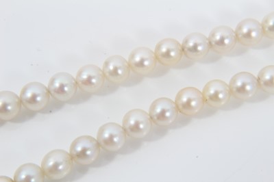 Lot 516 - Cultured pearl necklace with a string of graduated cultured pearls measuring approximately 5.5mm to 3.5mm on a good quality 14ct (585) gold and diamond clasp. Length approximately 45cm. In an assoc...